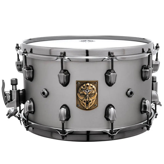 Snare drum with a decorative emblem on a white background