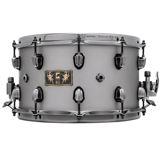Snare drum with a metallic finish on a white background